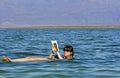 Girl floating at the Dead Sea Royalty Free Stock Photo