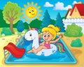 Girl floating on inflatable unicorn 3