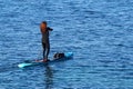 Girl floating on a SAP-board