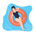 Girl floating on the water, sunbath on inflatable ring in the swimming pool or sea. Summer vacation relaxation resort Royalty Free Stock Photo