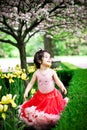 Girl in flower garden