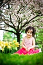 Girl in flower garden