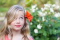 Girl with flower in hair Royalty Free Stock Photo