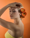 Girl with flower posing Royalty Free Stock Photo