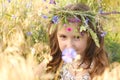 Girl with flowers diadem on her head Royalty Free Stock Photo