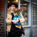 Girl with flowers at Spitalfield Market. London, 2017.