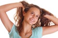 Girl fluffing hair Royalty Free Stock Photo