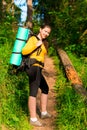 Girl in the forest in the morning hike Royalty Free Stock Photo