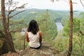 Girl in forest watching river Vltava from Vyhlidka Maj Royalty Free Stock Photo