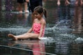 Girl in fountains Royalty Free Stock Photo
