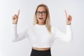 Girl freaking out seing gross things upwards. Portrait of stressed panicking glamour woman with blond hair open mouth