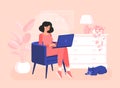 Girl freelancer is sitting in a chair with notebook