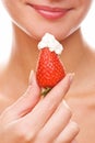 Girl with a fresh juicy strawberry Royalty Free Stock Photo