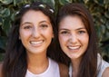 Girl friends, happy and smile portrait outdoor with laugh, leaves and students on break in a park. Garden, youth and hug Royalty Free Stock Photo