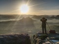 Girl frind photographer artist working on the edge view point Royalty Free Stock Photo