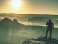 Girl frind photographer artist working on the edge view point Royalty Free Stock Photo