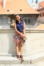 Girl in front of fountain Royalty Free Stock Photo