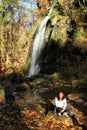 Girl in front of waterfall in Tercino udoli