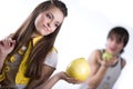 Girl with fruit and boy with apple Royalty Free Stock Photo