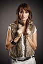 Girl in fur vest