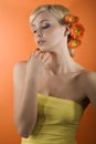 Girl with gerbera on head