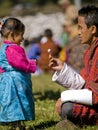 Girl gets candy from her father at a festival