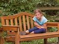 Girl Getting Angry on Park Bench Royalty Free Stock Photo