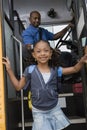 Girl Getting Off School Bus