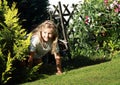 Girl getting out from bush Royalty Free Stock Photo