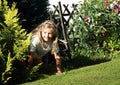 Girl getting out from bush Royalty Free Stock Photo