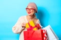 Girl with gift box and shopping bags Royalty Free Stock Photo