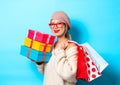 Girl with gift boxes and shopping bags Royalty Free Stock Photo