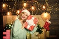 Girl with gift present. Be generous. Things to do before christmas. Charity and kindness. Woman hold gift box christmas