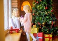 Girl gives a gift to her sister