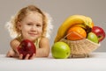 Girl giving an apple Royalty Free Stock Photo