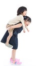 Girl giving her brother piggyback ride