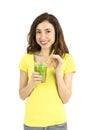 Girl with a glass of green smoothie