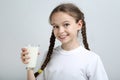 Girl with glass of milk