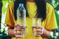 A girl with a glass of water A clean glass of nature Royalty Free Stock Photo