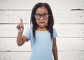 Girl with glasses against white wood panel Royalty Free Stock Photo