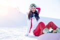 Girl in glasses with snowboard