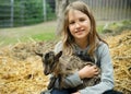 Girl with goatling