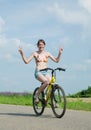 Girl goes on bicycle