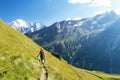 The girl goes on a mountain track