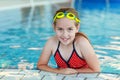 Girl with goggles in swimming pool Royalty Free Stock Photo