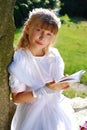 Girl going to the first holy communion Royalty Free Stock Photo