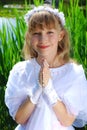 Girl going to the first holy communion Royalty Free Stock Photo