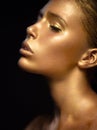 Girl with gold and silver skin in the image of an Oscar. Art image beauty face.