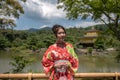 Girl at the Golden Pavilion - Kyoto, Japan Royalty Free Stock Photo