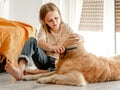 Girl with golden retriever dog Royalty Free Stock Photo